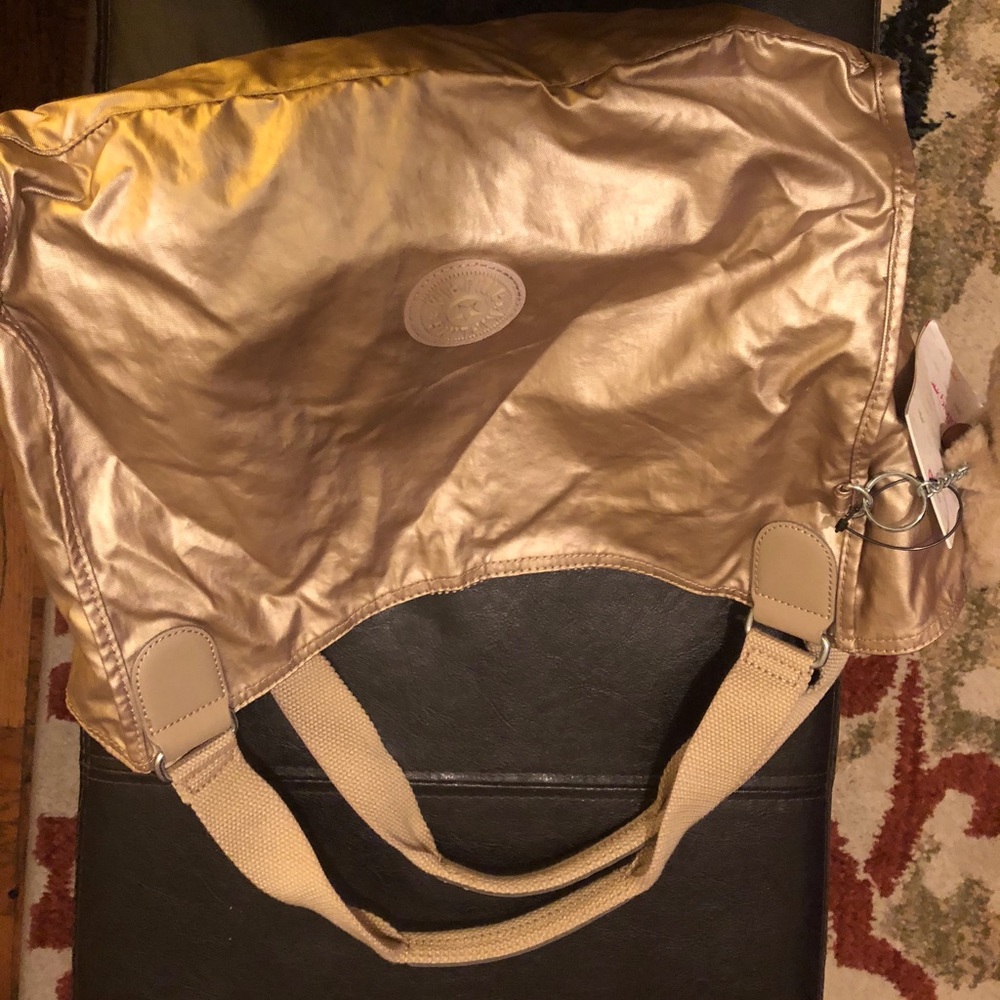 Kipling gold toasty serenade purse NWT